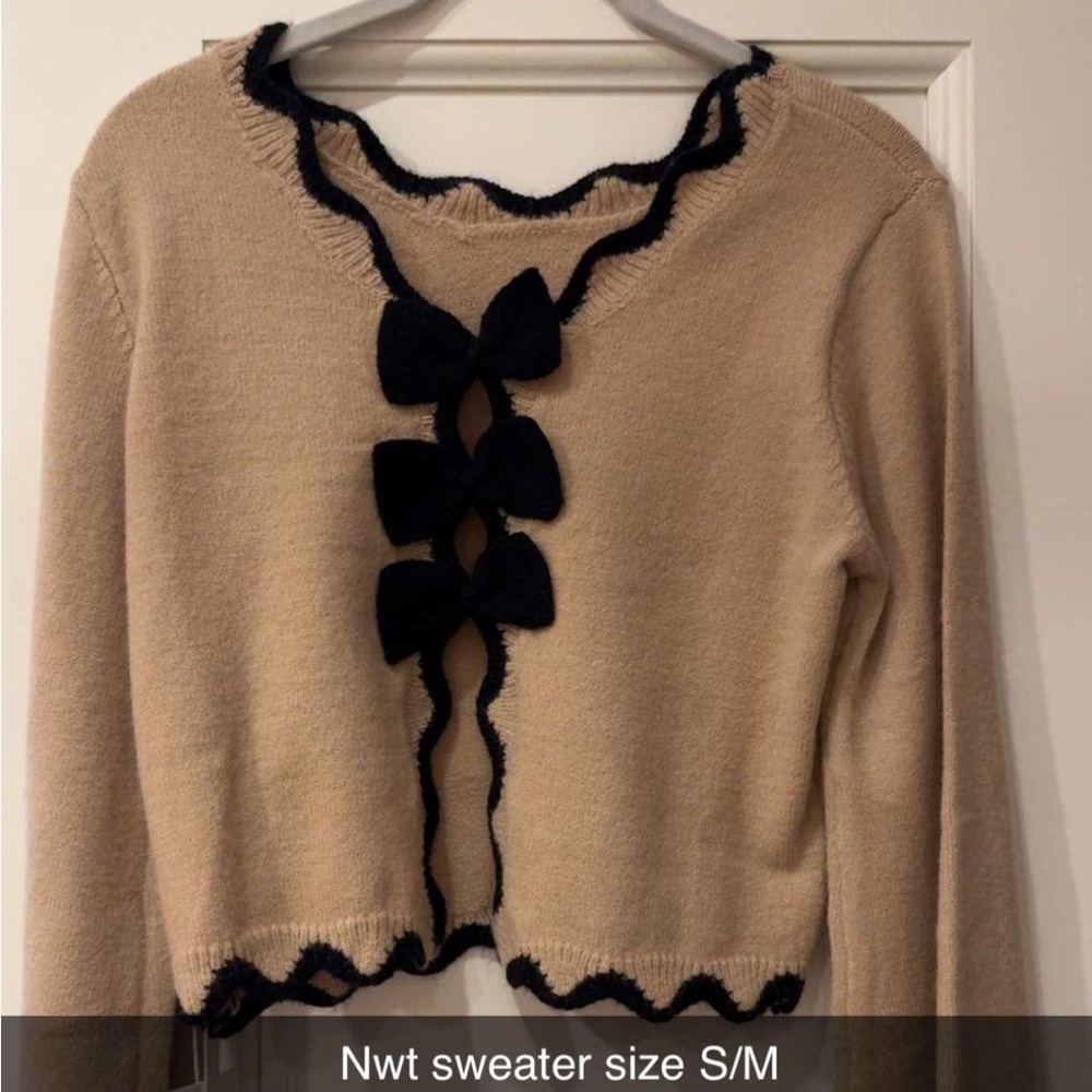 Chic Beige Cardigan with Black Trim